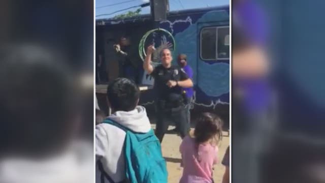 Officer dances to 'Get Up Offa That Thing'
