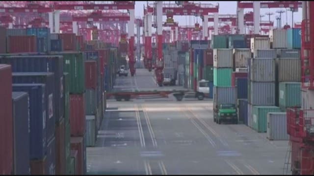 US tariffs take effect, China retaliates