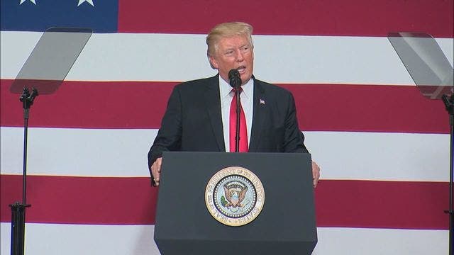 Trump says US should change tax law to punish NFL