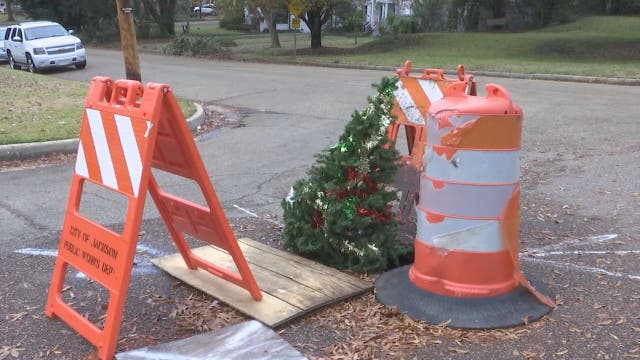Christmas tree planted in Mississippi pothole
