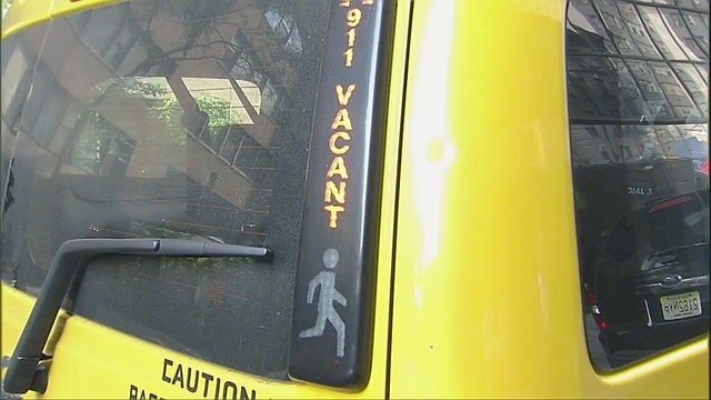 Cops: Woman steals taxi, picks up paying passengers