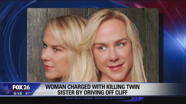 Sister charged with murder after crash that killed twin