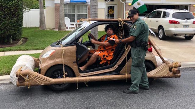Man dressed as Fred Flintstone has 'footmobile' seized in funny traffic stop