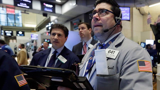 Oil prices tumble, but stocks trim losses after big slump