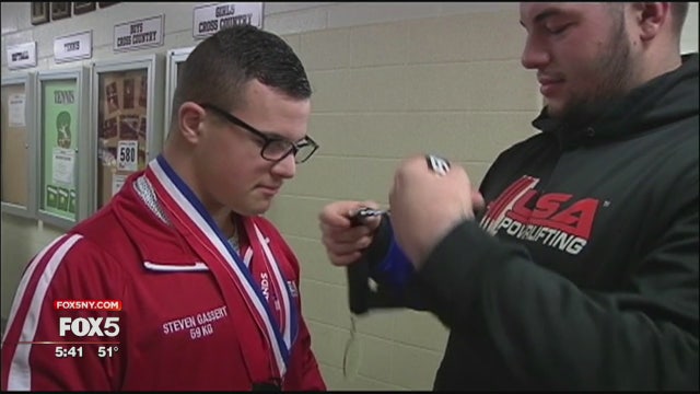 Weight lifter with Down syndrome aims to keep breaking records