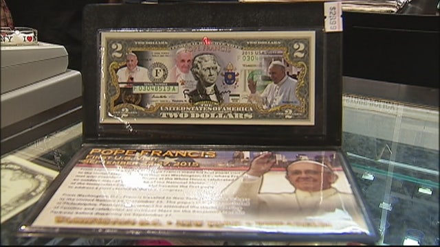 Pope-related souvenirs do brisk business