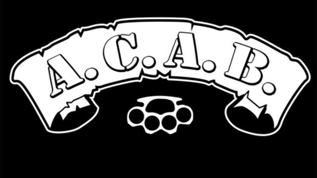 Cats or Cops? Spain police seek fine for lettering on bag