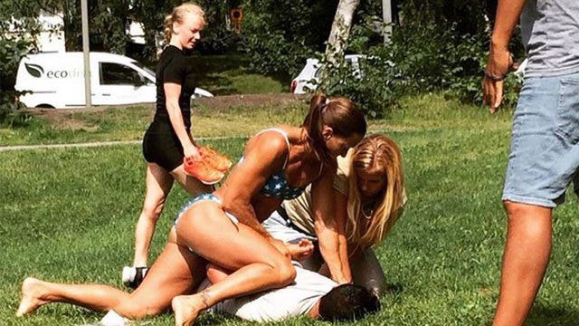 Bikini-clad Swedish cop makes arrest while sunbathing