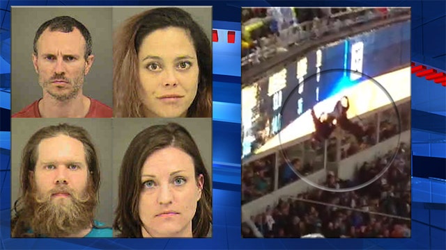 Protesters rappel into Panthers game