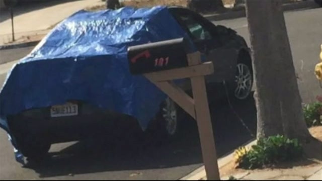 Woman drives for mile with body lodged in car