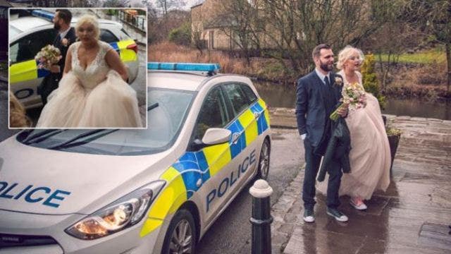 Newlyweds take cop car to reception after crash