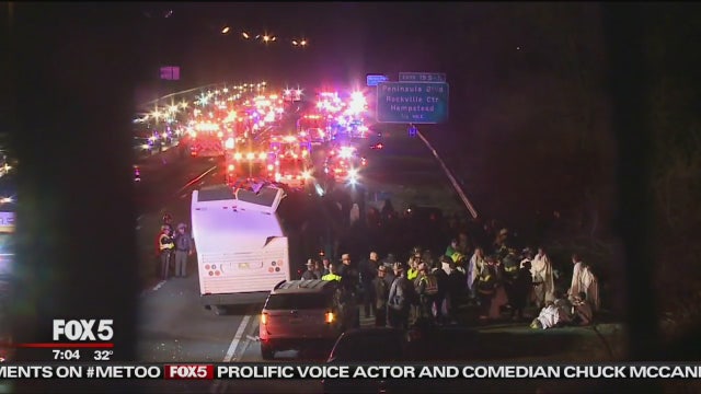 High school students injured when bus strikes overpass