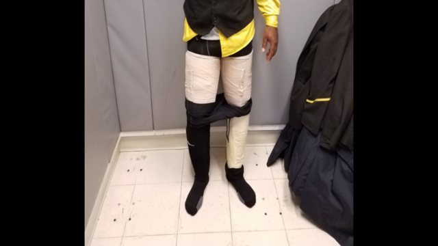 Flight attendant caught with cocaine taped to legs
