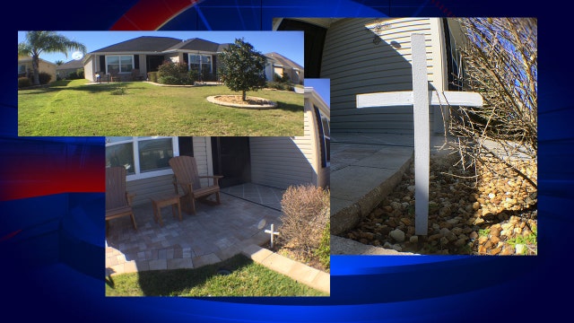 Florida couple ordered to remove cross from yard