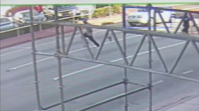 Cuffed suspect taken down with Taser