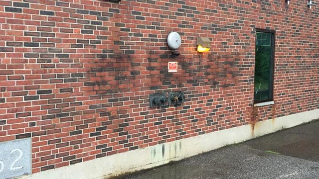 Vandal spray paints 'I'm drunk' on side of police station