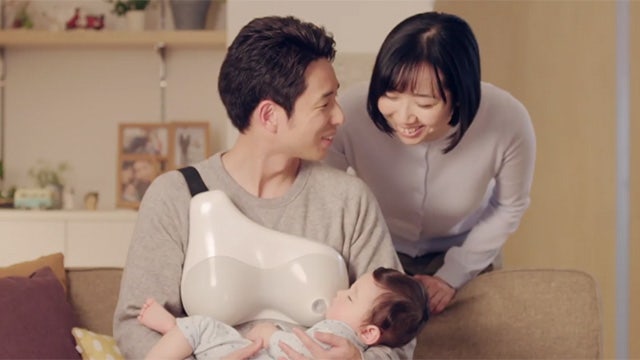 Japanese company designs wearable breastfeeding device for fathers to nurse babies