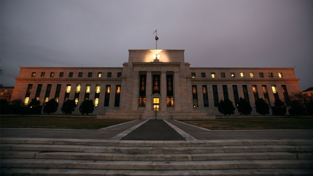 Fed cuts key rate for first time in more than a decade