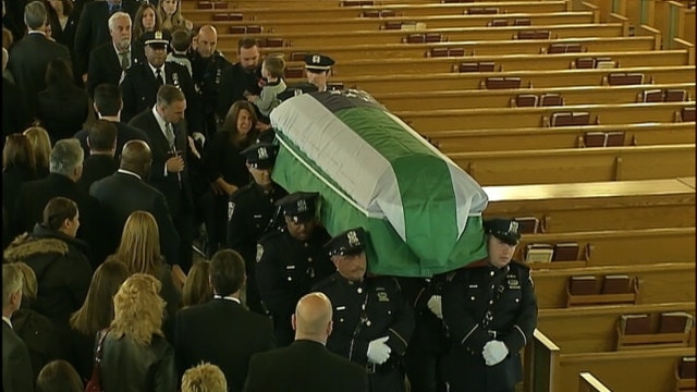 Thousands of officers line streets for slain NYC sergeant