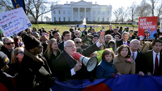 Federal workers protest as payday without pay hits as government shutdown drags on