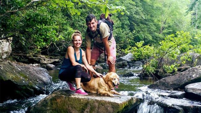 Owner carried timid golden retriever over bridge