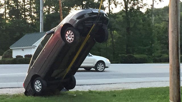 GPS tells driver to turn around; car ends up almost vertical