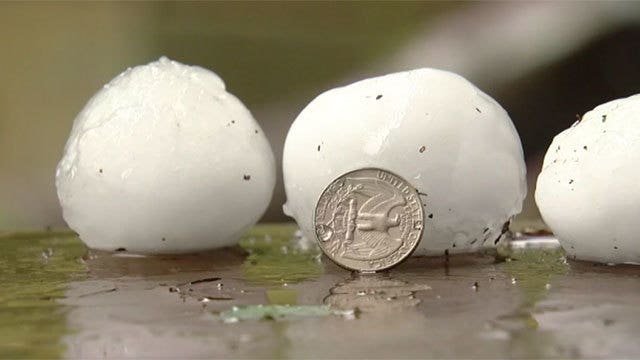 Italy struck with orange-size hail, tornado and beach fire