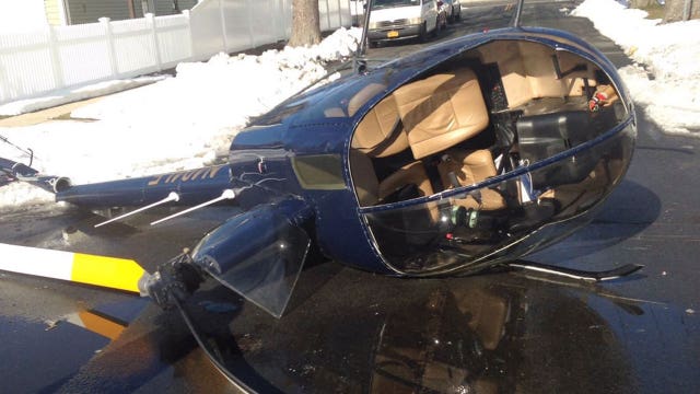 Helicopter crash lands on Long Island street