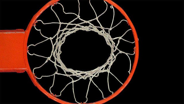 Teen dies after hoop crashes down as he dunked basketball