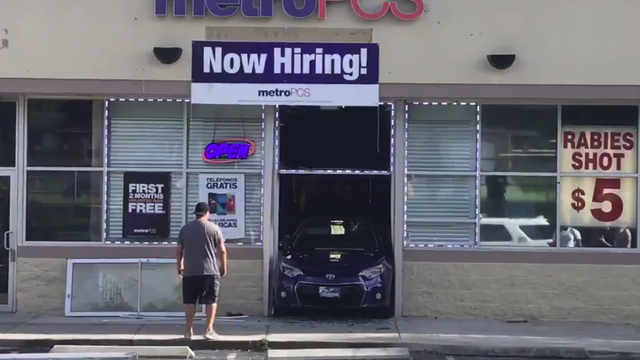 Car slams into Metro PCS store in alleged smash and grab
