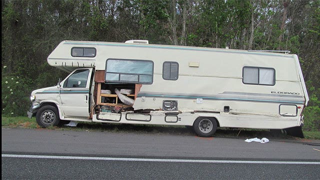 Man dies after falling through hole torn in RV