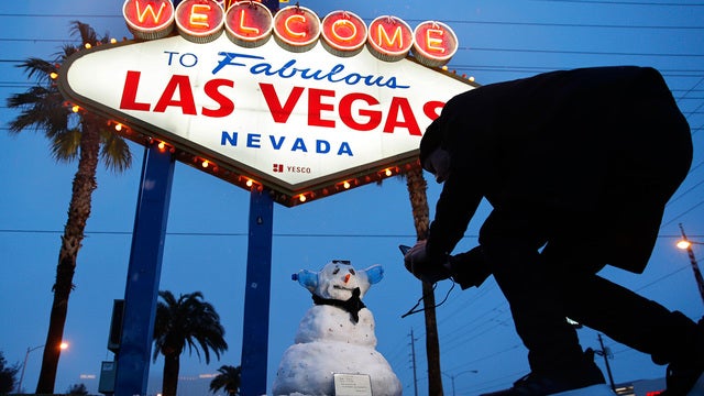 Snowman spotted on Vegas Strip as city sees rare white stuff