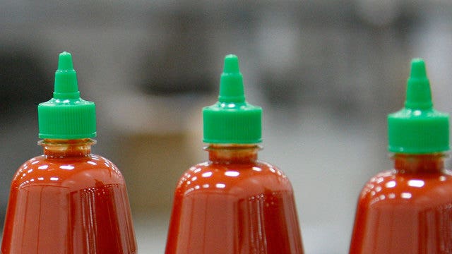 Man arrested after sriracha-on-pizza dispute
