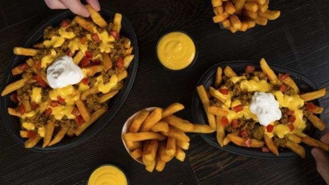 Taco Bell bringing back Nacho Fries, debuting futuristic restaurant to go with it