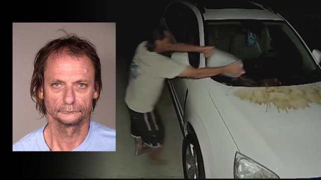 Man arrested for pouring urine on neighbor's car