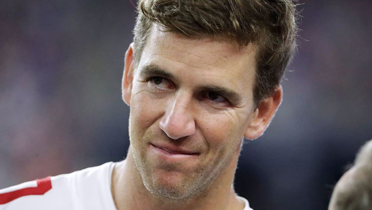 77e58873-EliManning_1567627618586.jpg