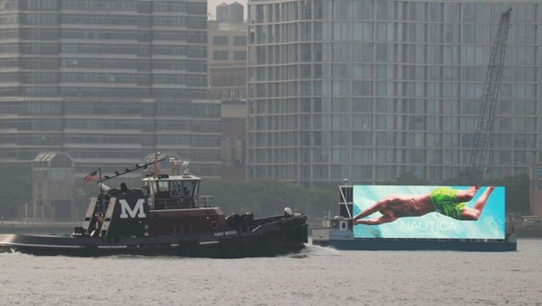 84d1d286-Getty_DigitalBillboardHudsonRiver_081919_1566316928201.jpg
