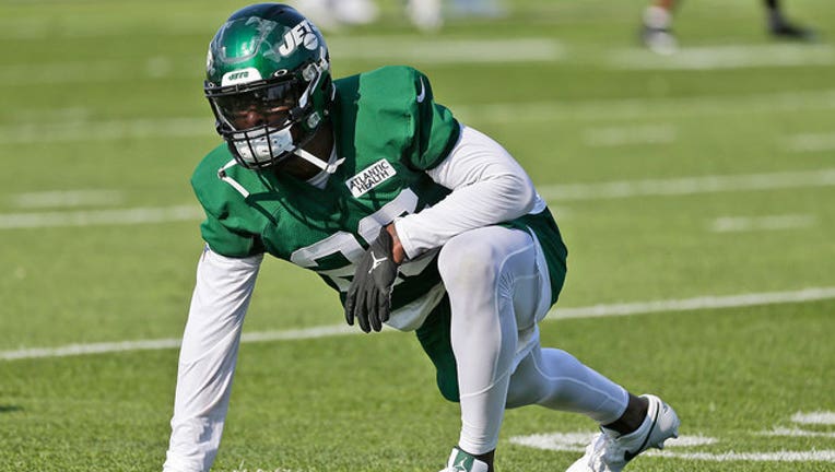 In this July 25, 2019, file photo, New York Jets running back Le'Veon Bell takes part in practice at the NFL football team's training camp in Florham Park, N.J.