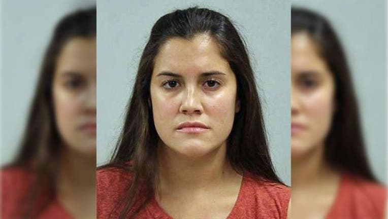 Woman arrested for sunbathing topless in front of child 