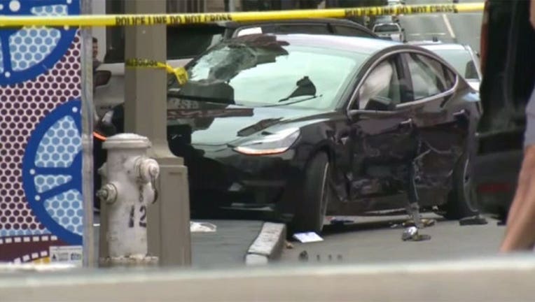 69c54221-tesla-crash_1563822802875.jpg
