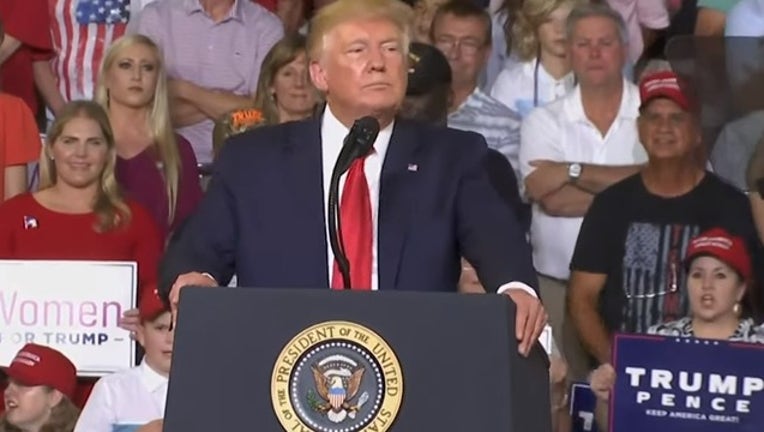 199b9d69-trump rally_1563452109114.png-402429.jpg