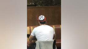 Man wears hat with swastika into NY diner