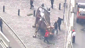 Charging Bull statue vandalized during climate change protest