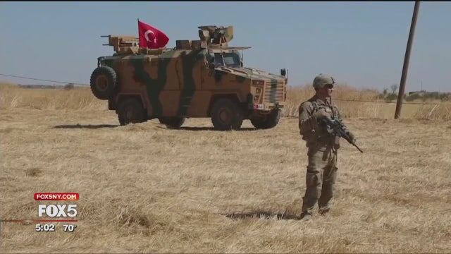Turkey presses Syrian assault as thousands flee the fighting