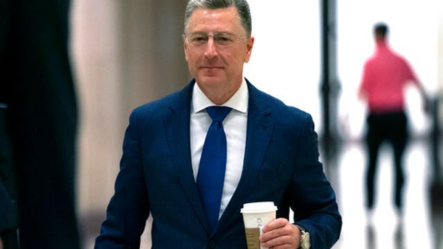 Diplomat at center of Trump inquiry says he warned Ukraine