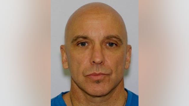 Man caught after robbing bank in front of officer