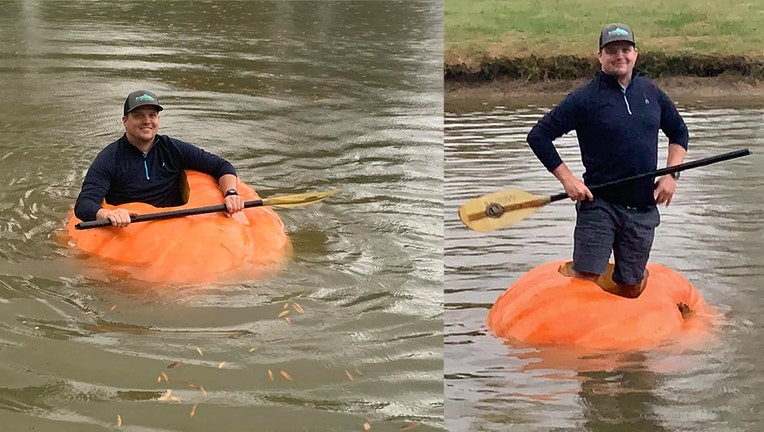 Justin Ownby's wife photographed him paddling in his 910-pound boat.