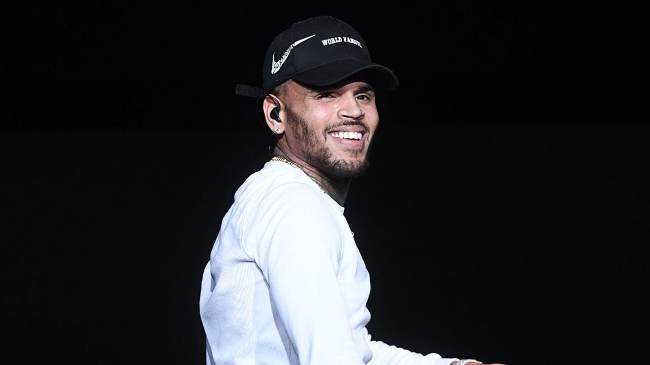Chris Brown shares home address, says he's having a yard sale at