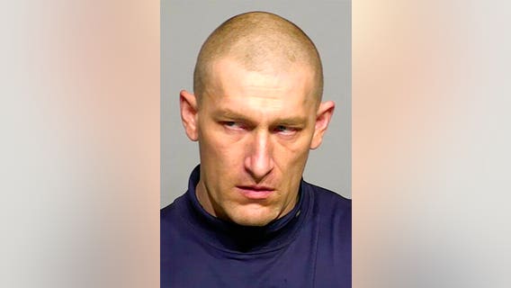 Man with weapons stash found in bunker by Milwaukee River