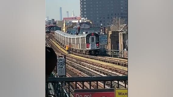 VIDEO: Two men seen subway surfing in Queens